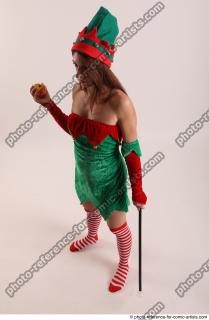 Veronika Elf Pose With Apple